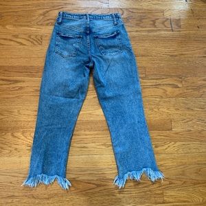 Blue jeans with zipper down the side
